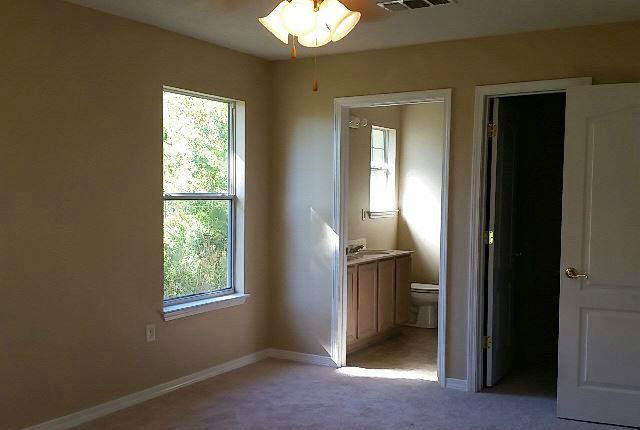 27 West Poplar Way Santa Rosa Beach, FL 32459 - Photo 22 of 22 an empty room and window