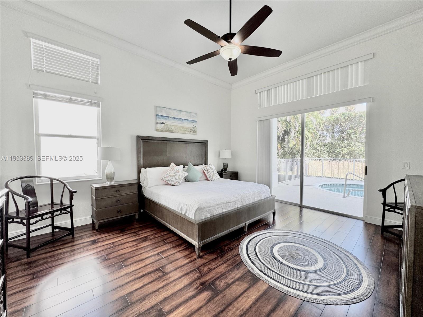 19754 Dinner Key Drive Boca Raton, FL 33498 - Photo 14 of 48 a bedroom with a bed and a table