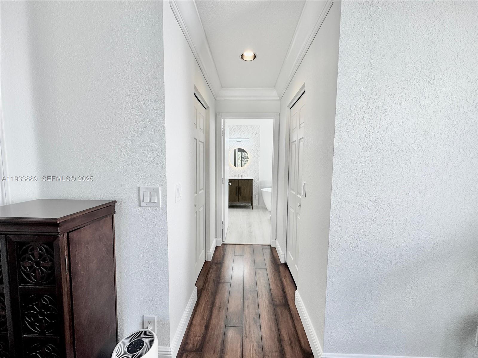 19754 Dinner Key Drive Boca Raton, FL 33498 - Photo 16 of 48 a view of hallway with wooden floor