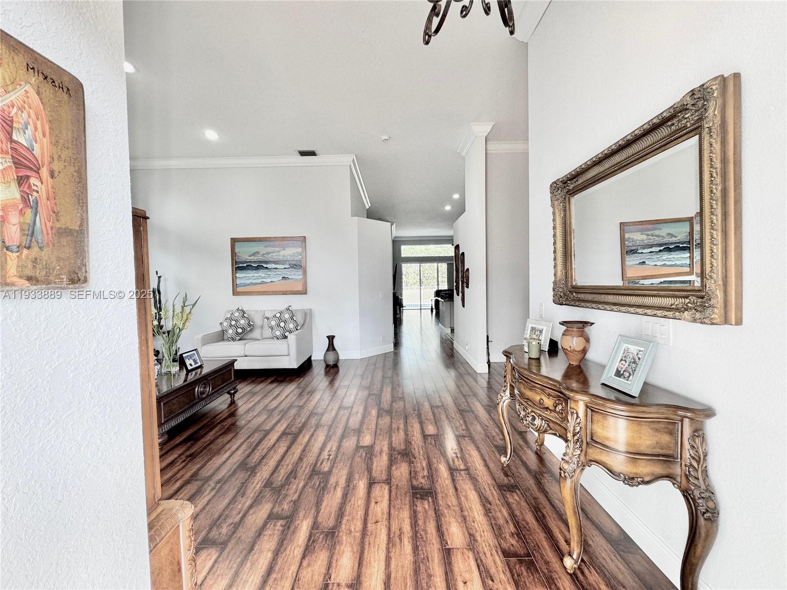 19754 Dinner Key Drive Boca Raton, FL 33498 - Photo 2 of 48 a living room with furniture and a wooden floor