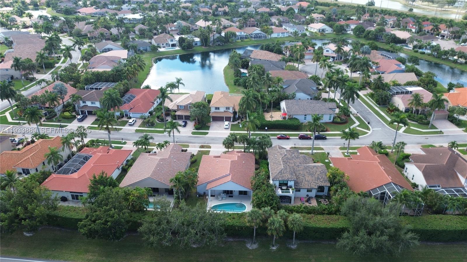19754 Dinner Key Drive Boca Raton, FL 33498 - Photo 29 of 48 an aerial view of residential houses with outdoor space and parking