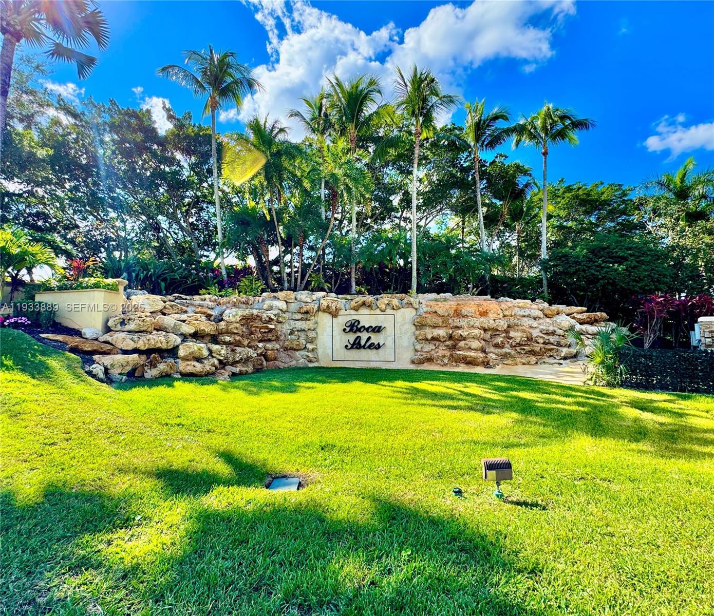 19754 Dinner Key Drive Boca Raton, FL 33498 - Photo 31 of 48 a view of a swimming pool with an outdoor space and seating area