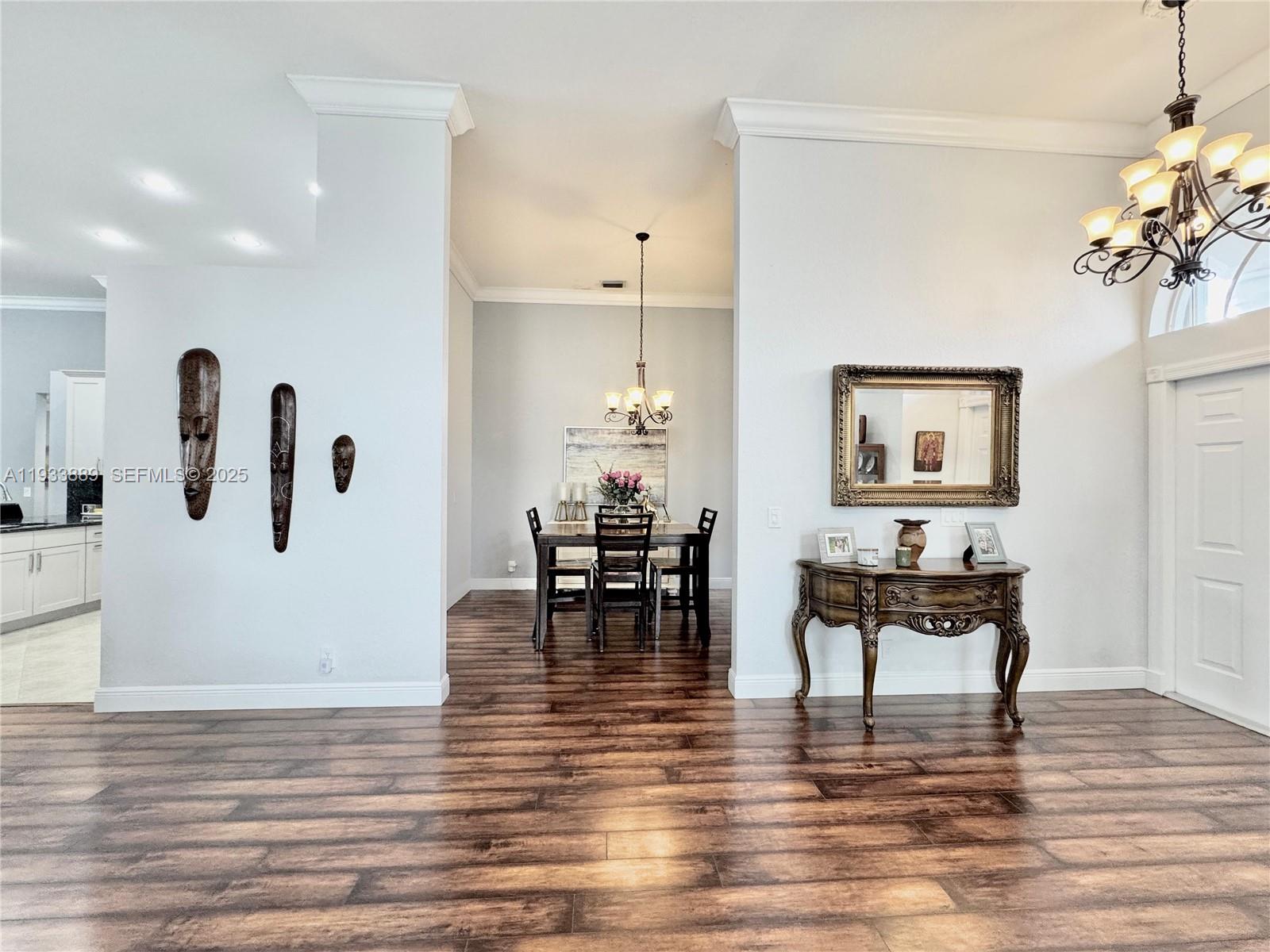 19754 Dinner Key Drive Boca Raton, FL 33498 - Photo 5 of 48 a living room with furniture and a wooden floor