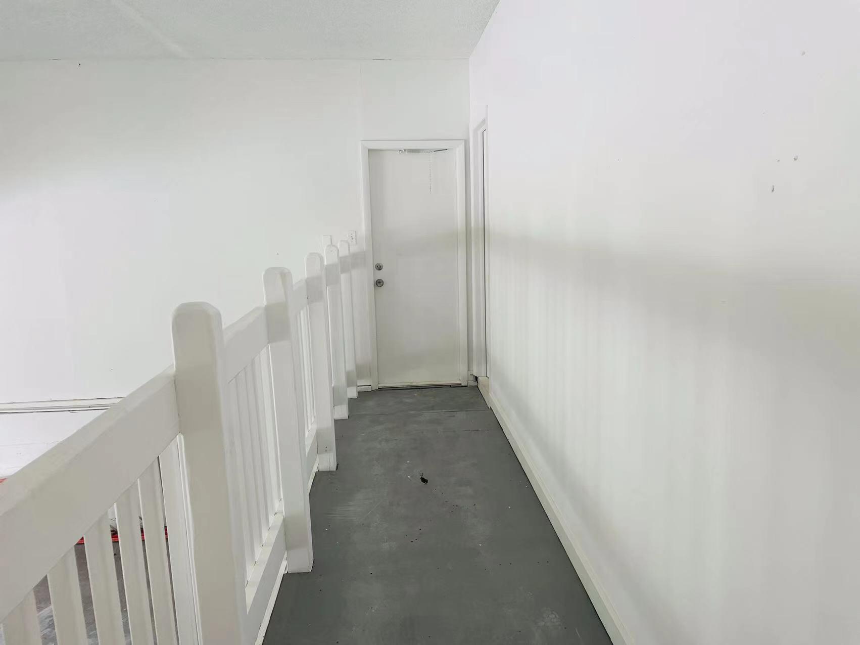 9296 166th Way North Jupiter, FL 33478 - Photo 22 of 31 a view of hallway with stairs