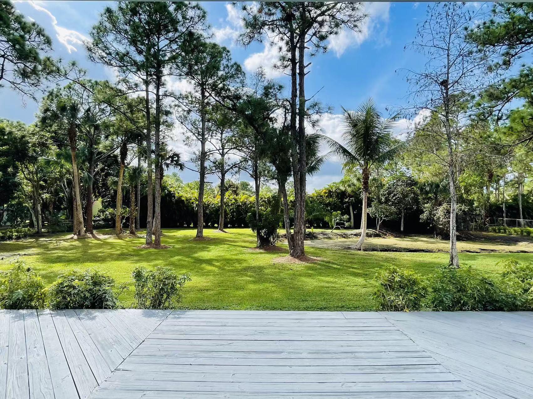 9296 166th Way North Jupiter, FL 33478 - Photo 27 of 31 a view of a park and trees