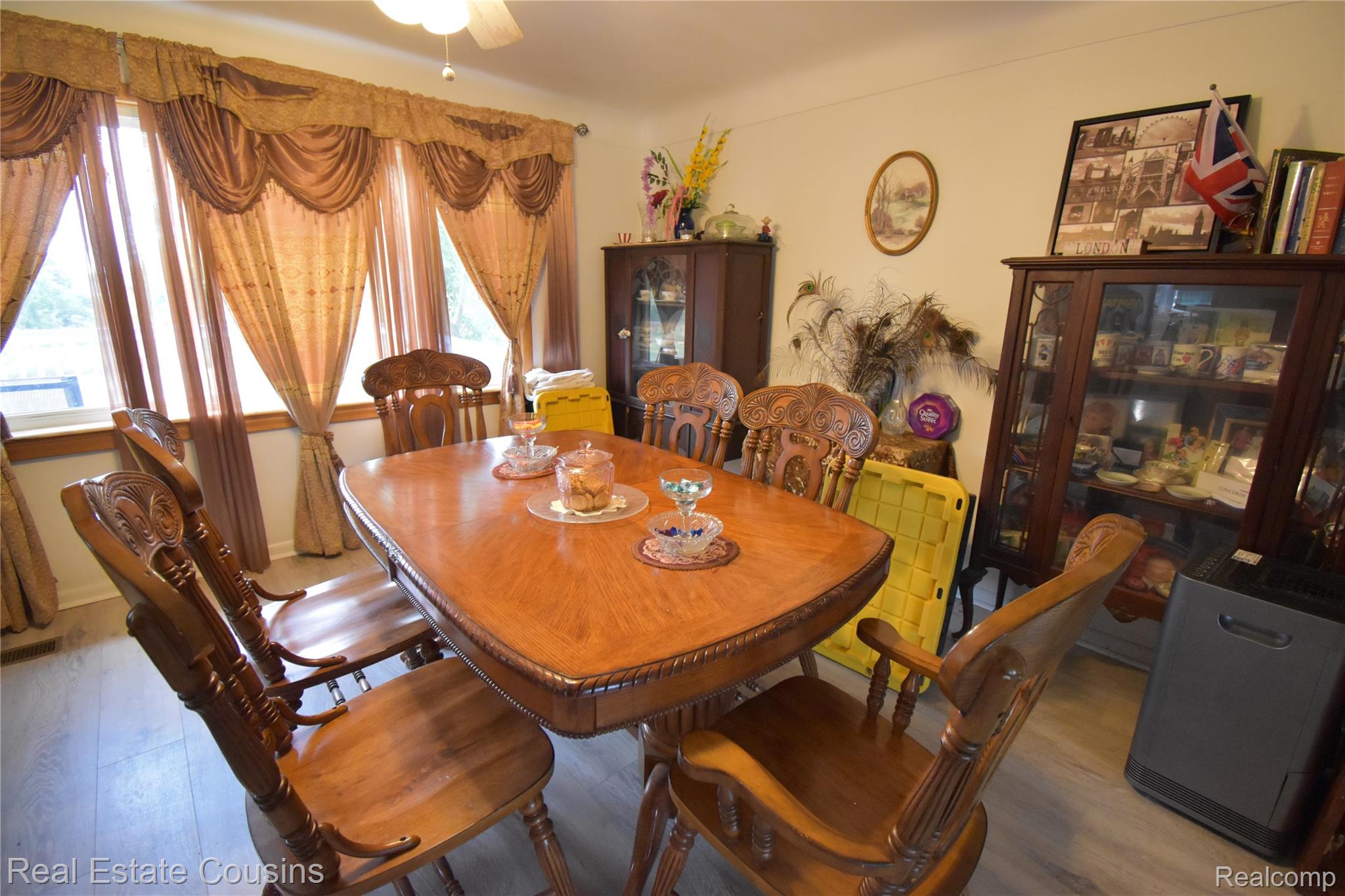 2247 Johnson Mill Road North Branch, MI 48461 - Photo 5 of 22 Dining area featuring wood-finish flooring and multiple windows