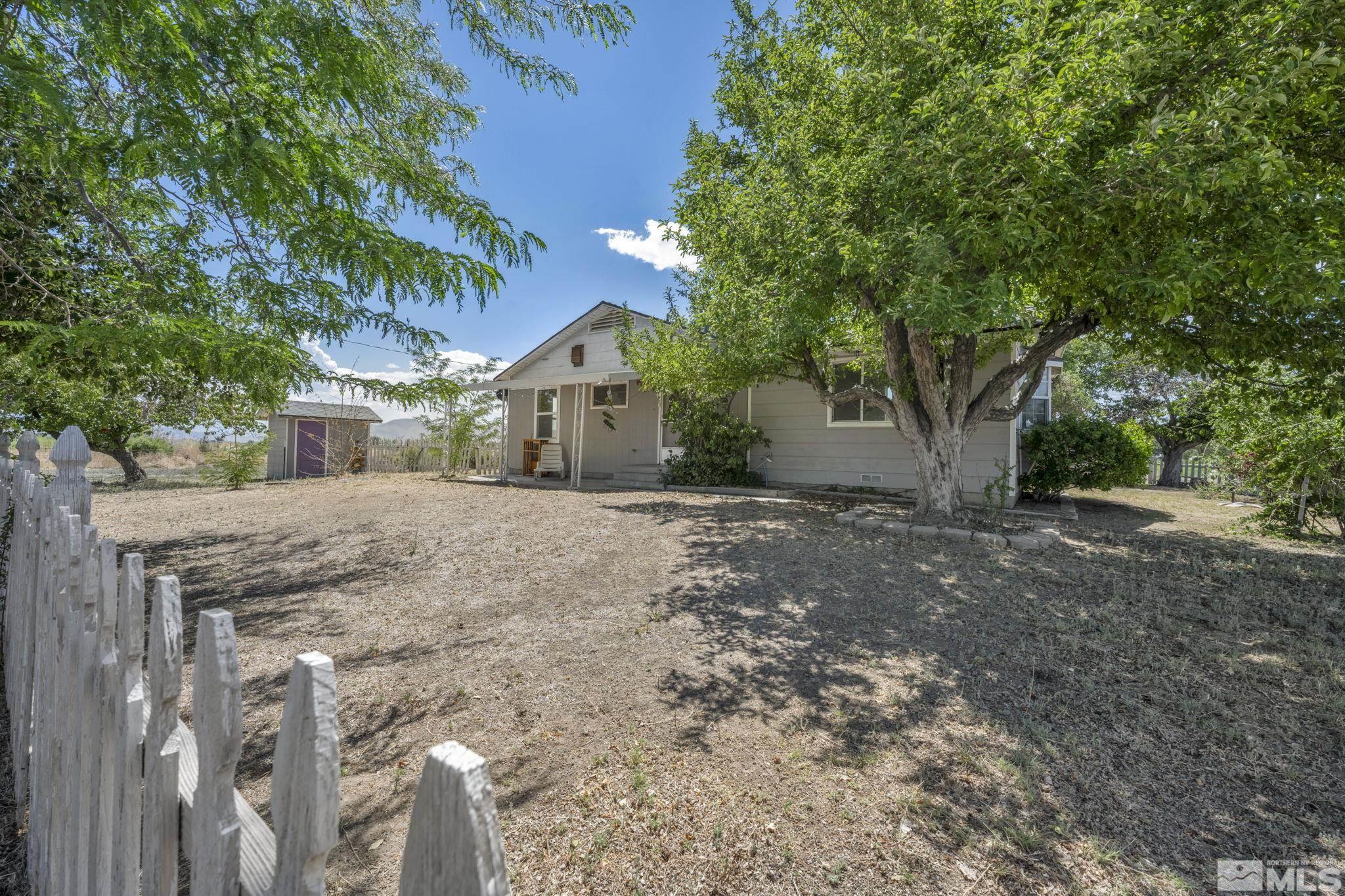 95 East Hwy 95a Yerington, NV 89447 - Photo 11 of 35 a view of a house with a tree
