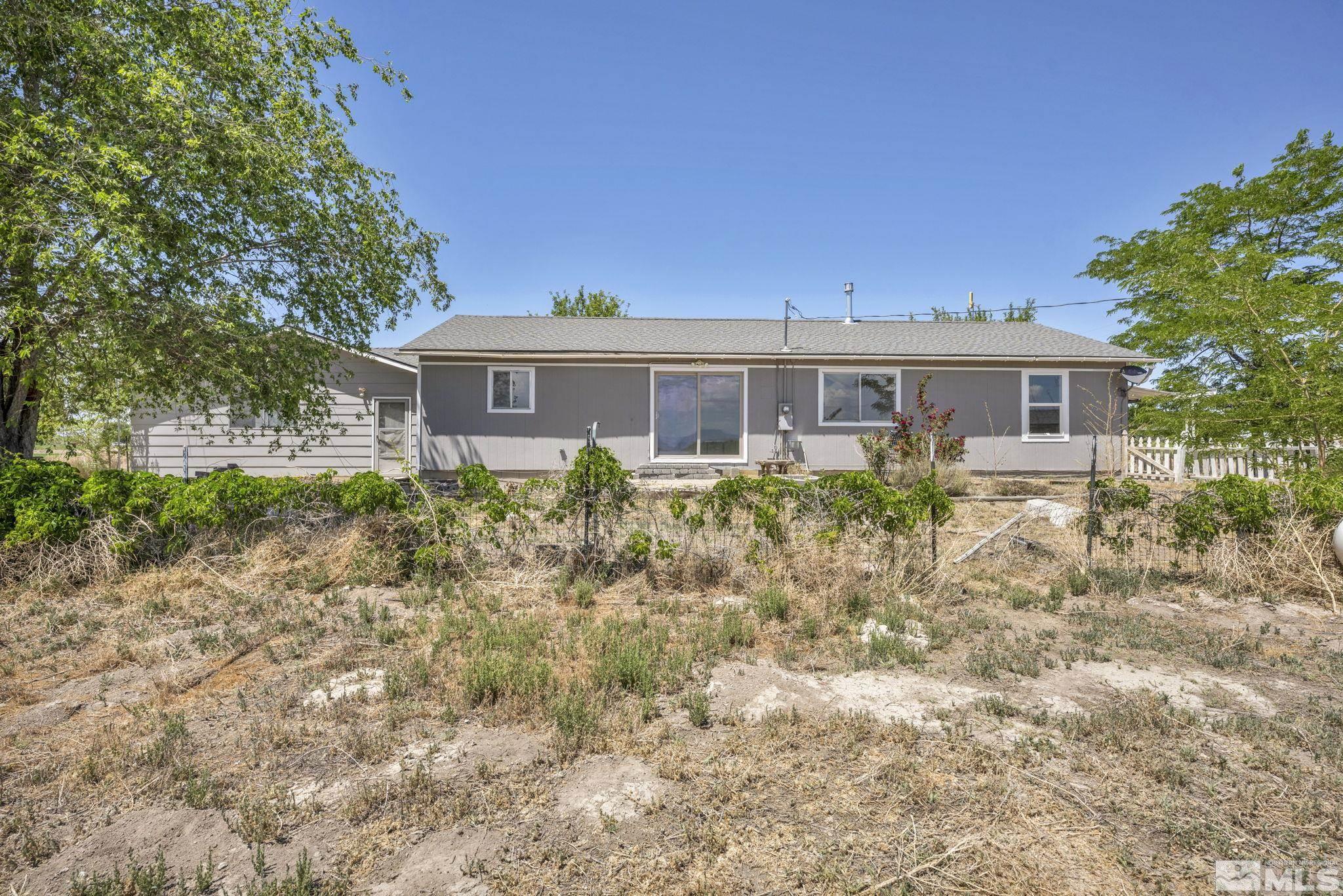 95 East Hwy 95a Yerington, NV 89447 - Photo 12 of 35 a front view of a house with garden