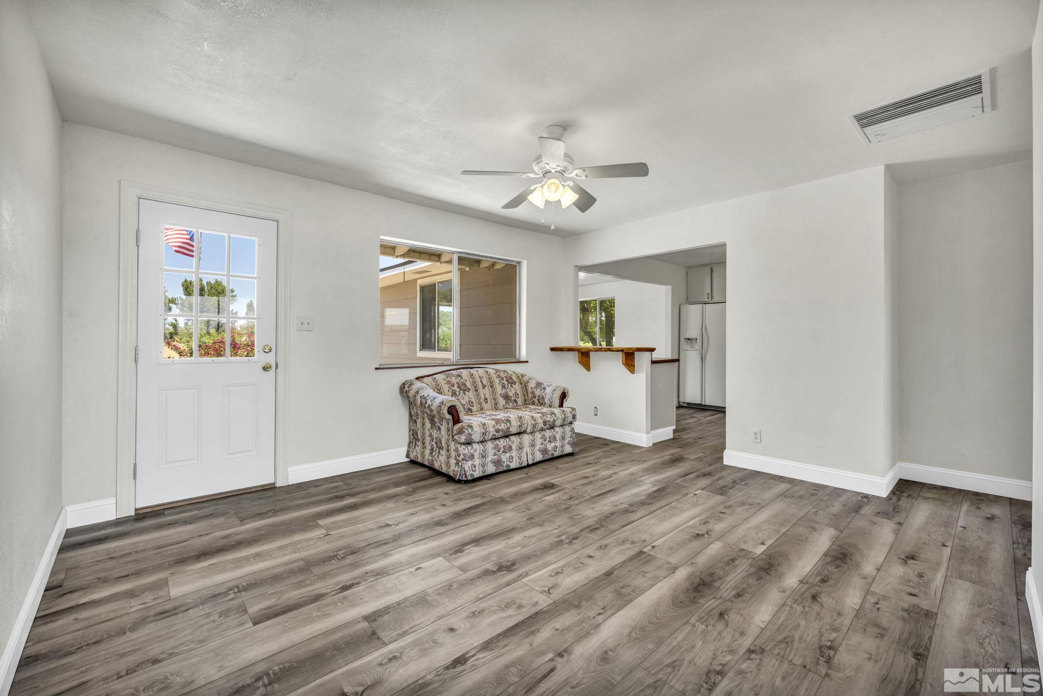 95 East Hwy 95a Yerington, NV 89447 - Photo 18 of 35 a living room with furniture and a wooden floor