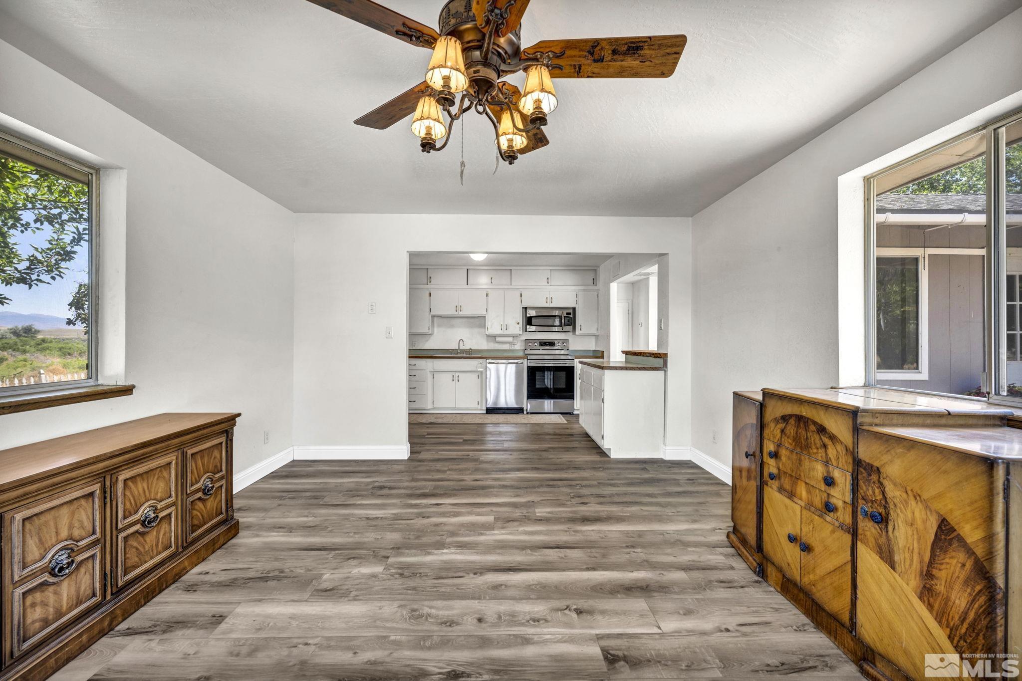 95 East Hwy 95a Yerington, NV 89447 - Photo 26 of 35 a view of kitchen with stainless steel appliances granite countertop cabinets and a dining table