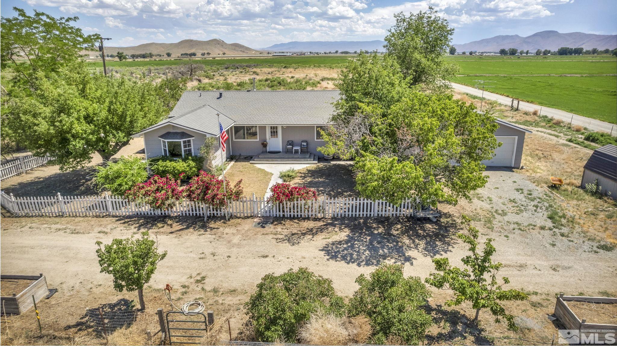 95 East Hwy 95a Yerington, NV 89447 - Photo 3 of 35 a view of a house with a yard and garden