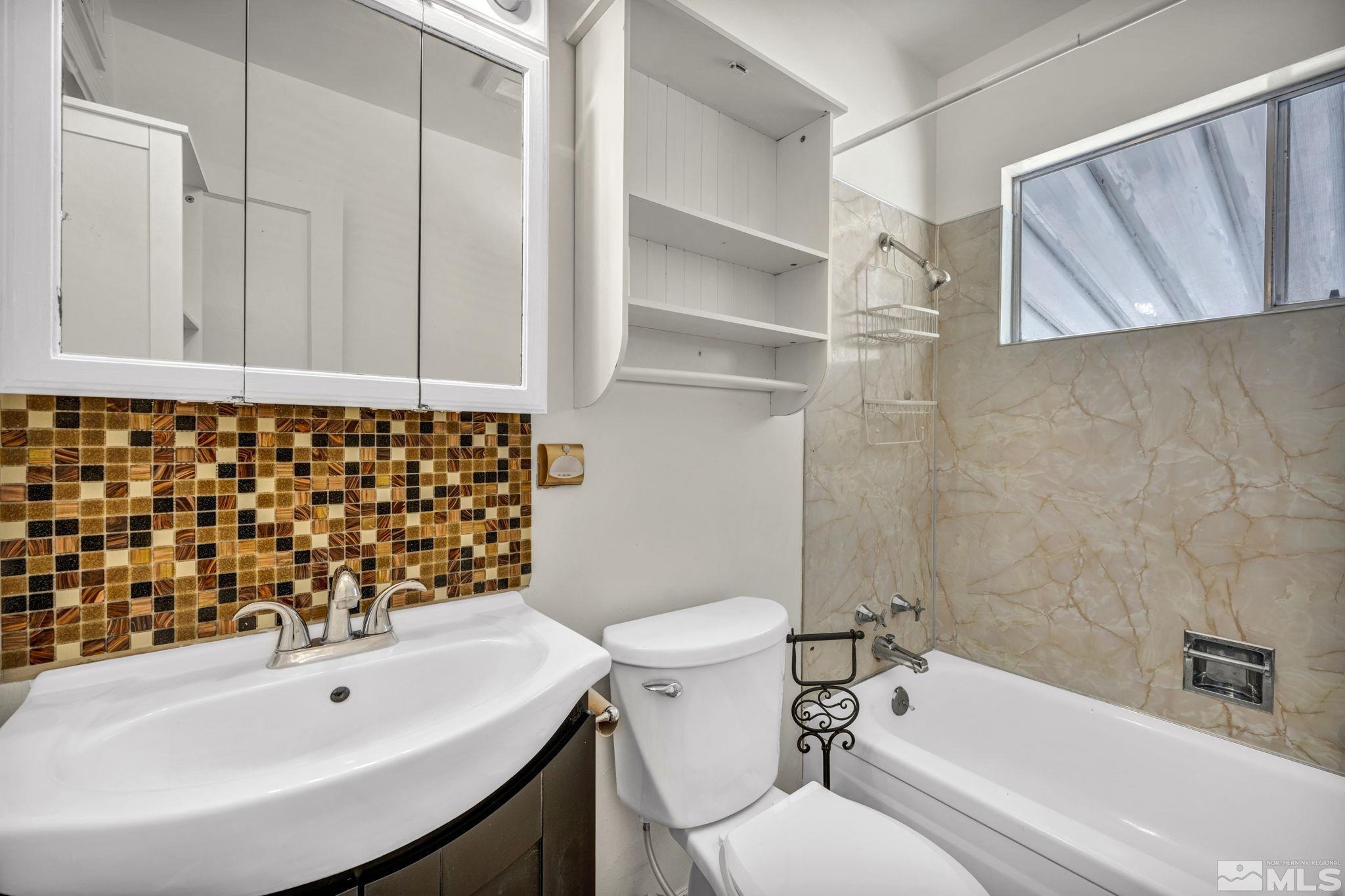 95 East Hwy 95a Yerington, NV 89447 - Photo 32 of 35 a bathroom with a sink and a bathtub