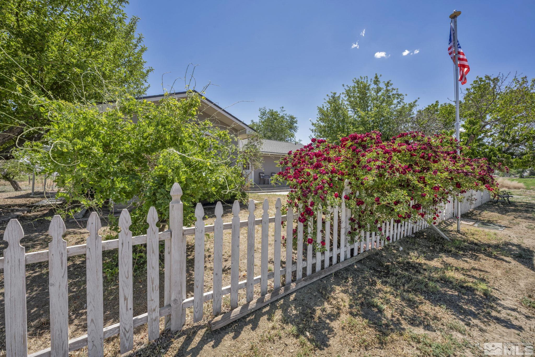 95 East Hwy 95a Yerington, NV 89447 - Photo 5 of 35 a view of a house with a flower garden