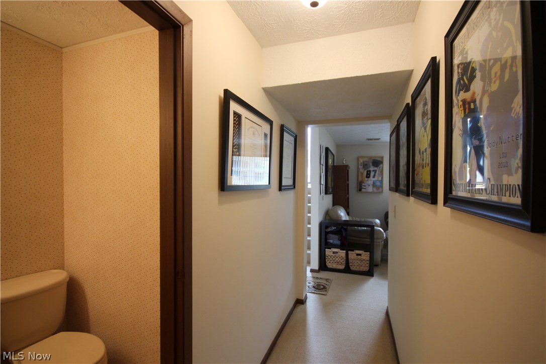 8 Romine Road Washington, WV 26181 - Photo 26 of 34 Hallway leads to 4th bedroom and half bath.