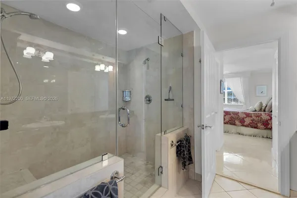 a bathroom with a shower and a toilet