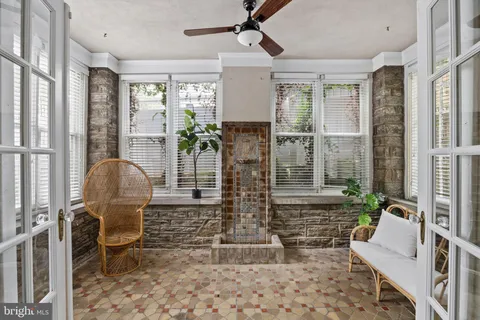 a white toilet sitting next to a bathroom sink
