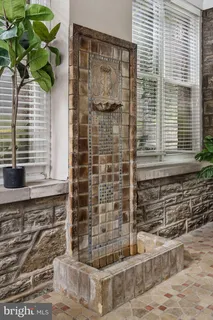 a bed room with furniture and a window