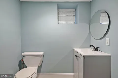 a bathroom with a bathtub and a sink