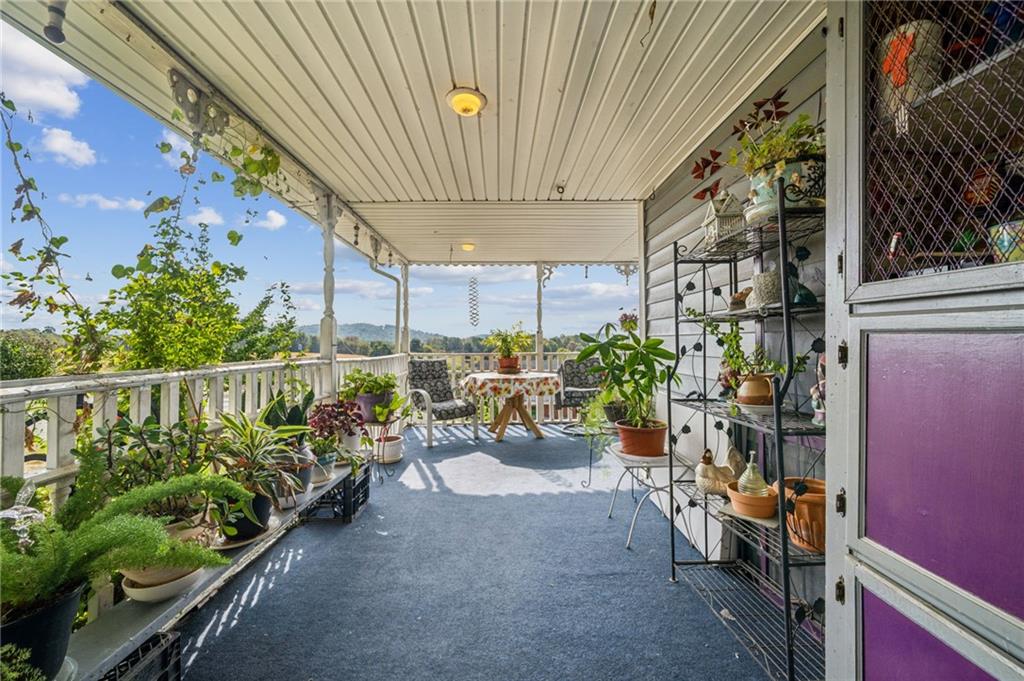 115 Truxall Road Apollo, PA 15613 - Photo 11 of 39 a view of a chairs and table in a balcony