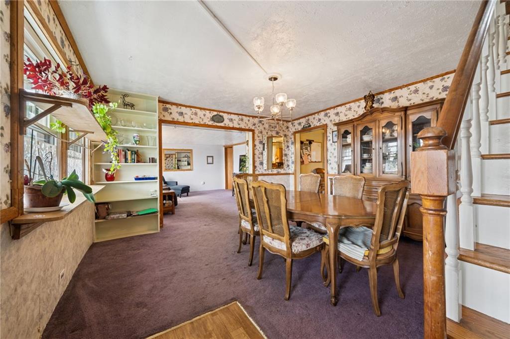 115 Truxall Road Apollo, PA 15613 - Photo 15 of 39 a dining room with furniture and large windows