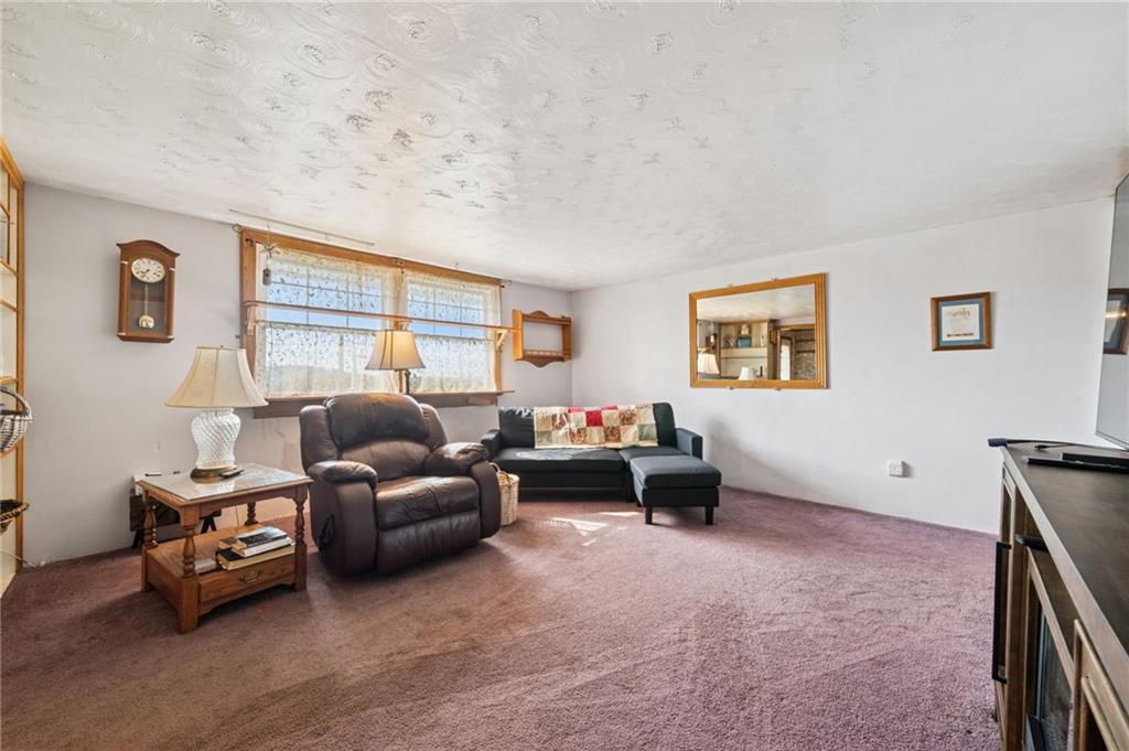 115 Truxall Road Apollo, PA 15613 - Photo 19 of 39 a living room with furniture and a window