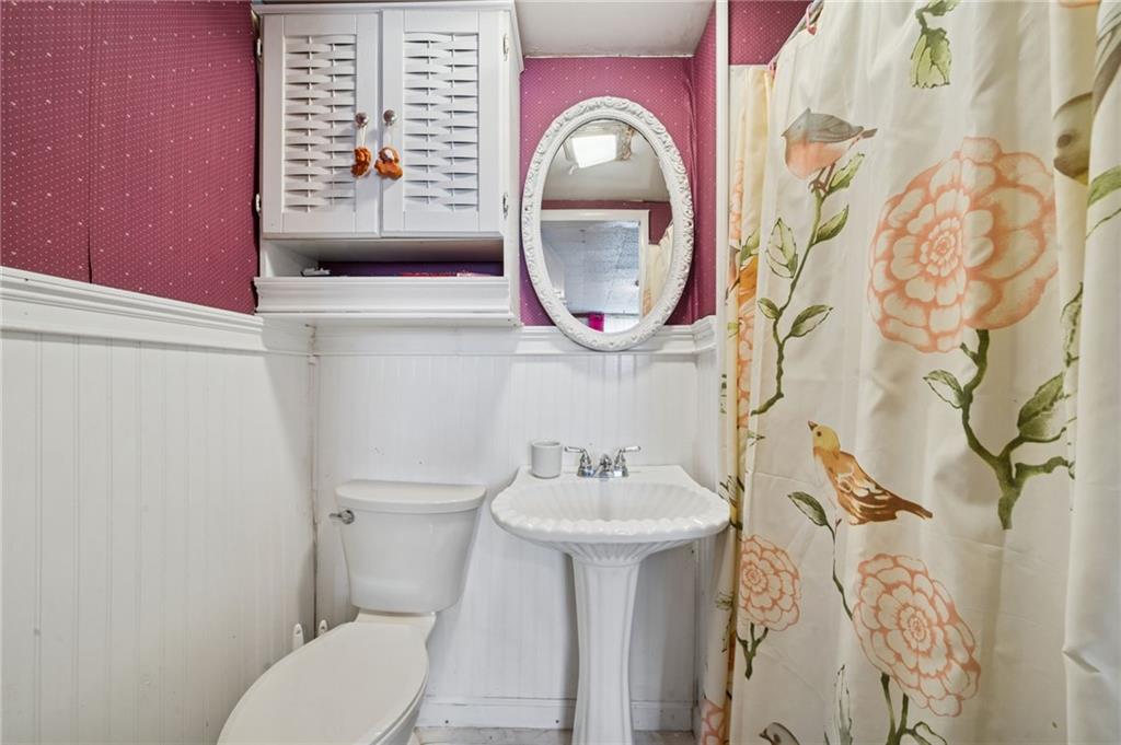 115 Truxall Road Apollo, PA 15613 - Photo 23 of 39 a bathroom with a sink and a mirror