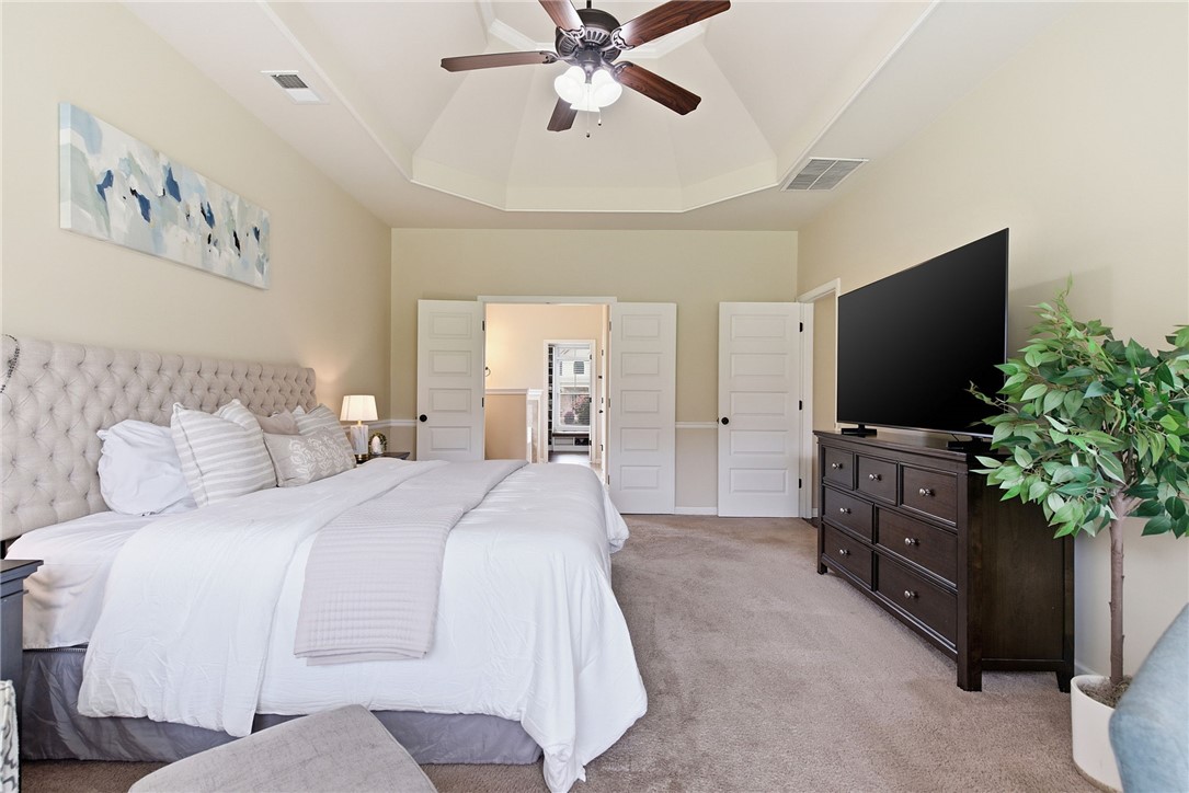 138 Buckland Drive Anderson, SC 29621 - Photo 23 of 49 This spacious bedroom features a stylish ceiling fan, adding comfort and architectural interest.