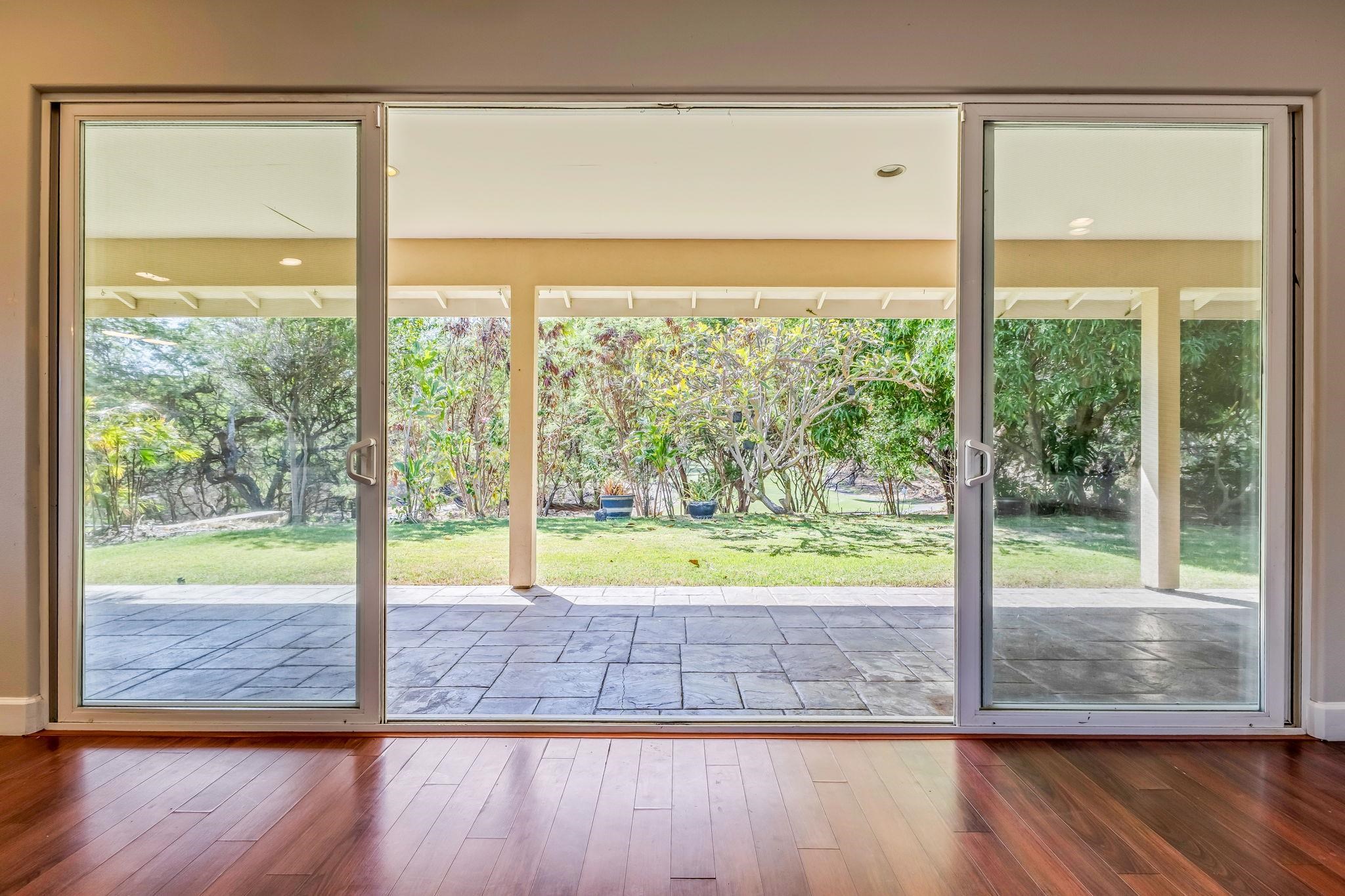 33 Keoneloa Street Wailuku, HI 96793 - Photo 11 of 40 a view of a room with wooden floor and a porch