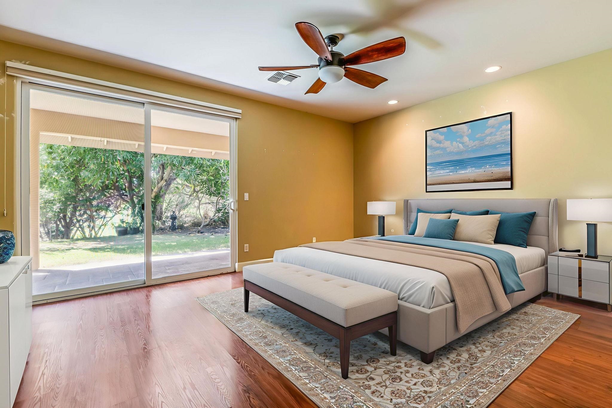 33 Keoneloa Street Wailuku, HI 96793 - Photo 19 of 40 a spacious bedroom with a large bed and a large window