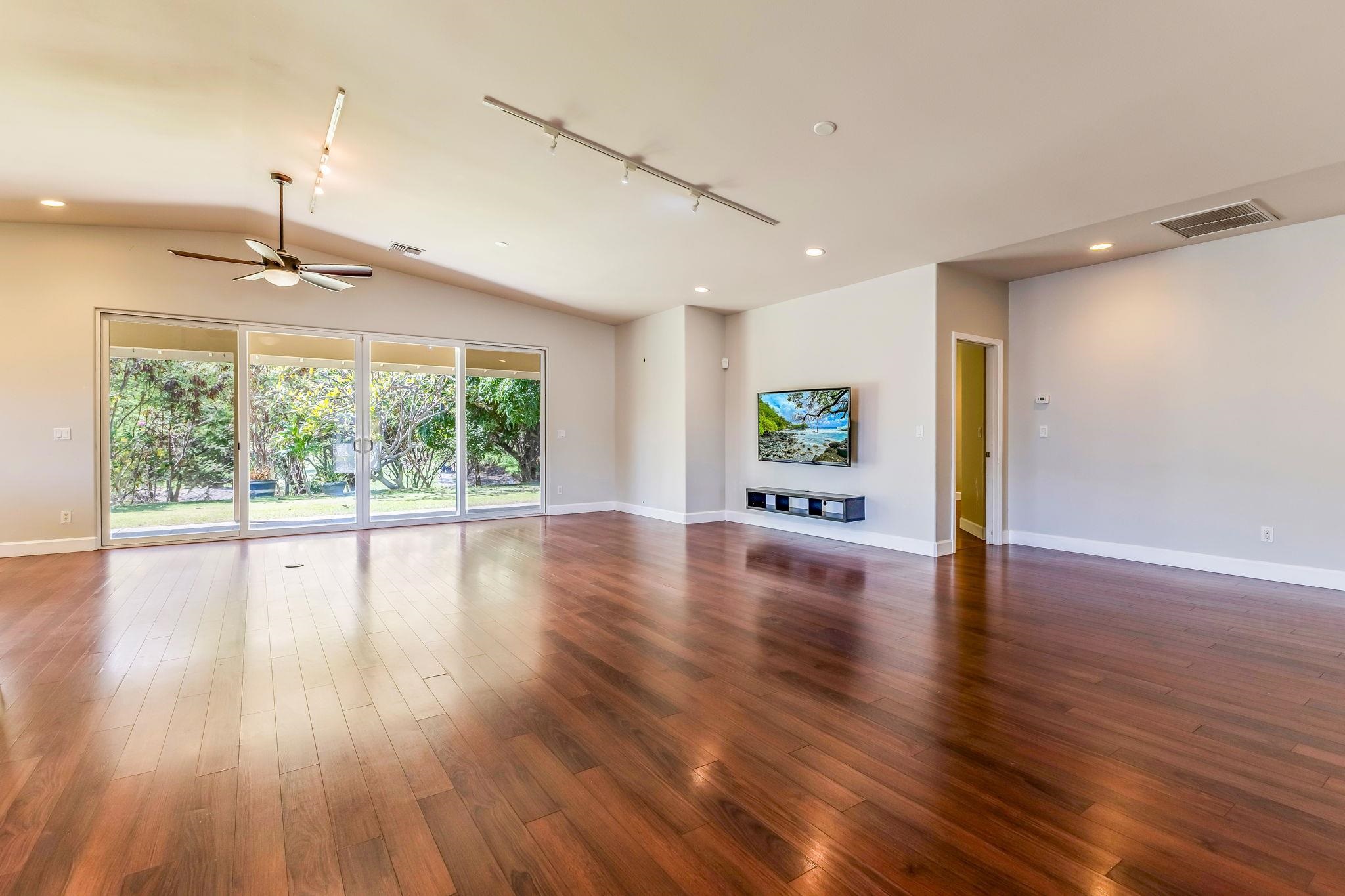 33 Keoneloa Street Wailuku, HI 96793 - Photo 35 of 40 a view of an empty room with wooden floor and a window