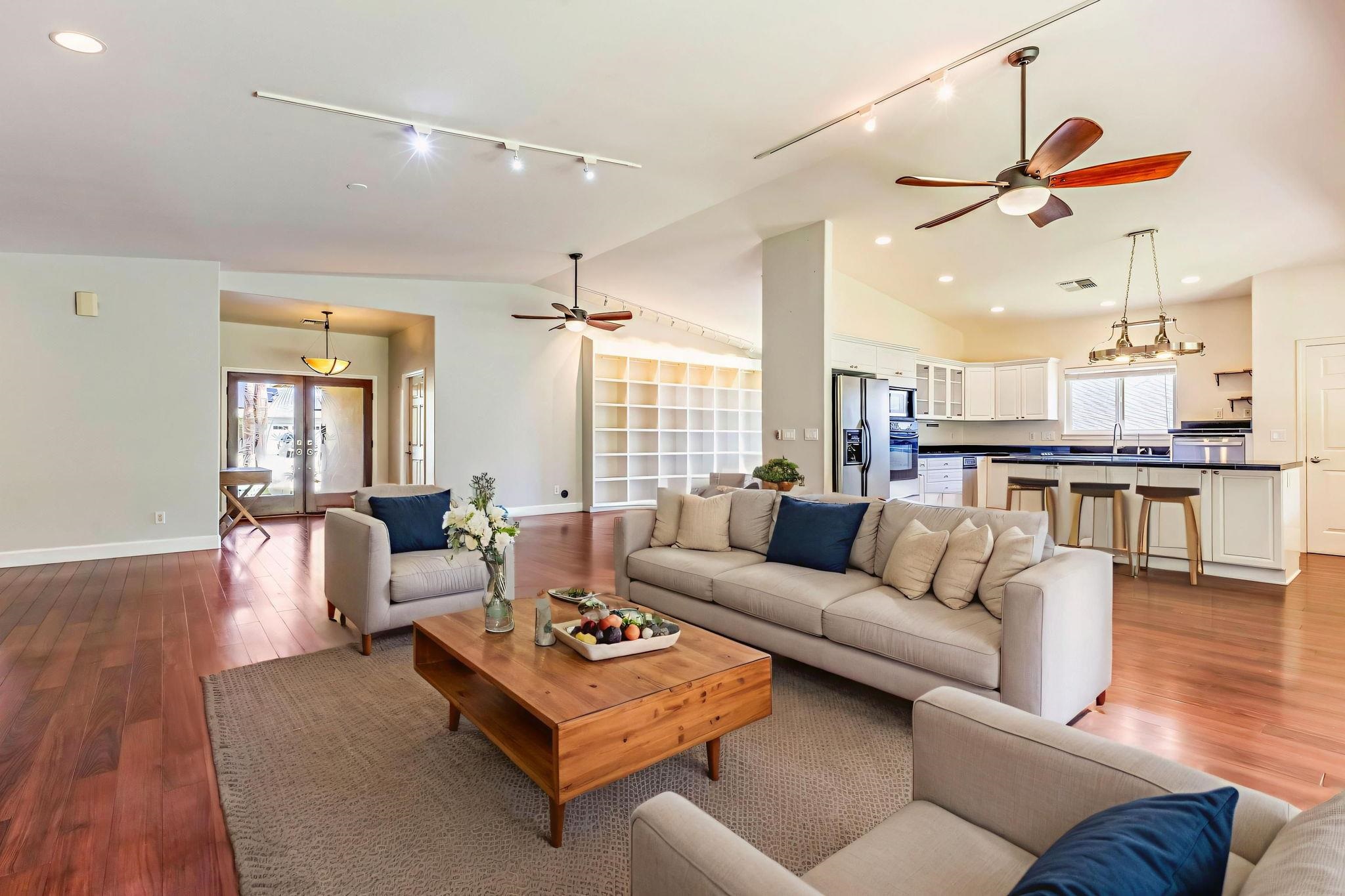 33 Keoneloa Street Wailuku, HI 96793 - Photo 4 of 40 a living room with furniture and wooden floor