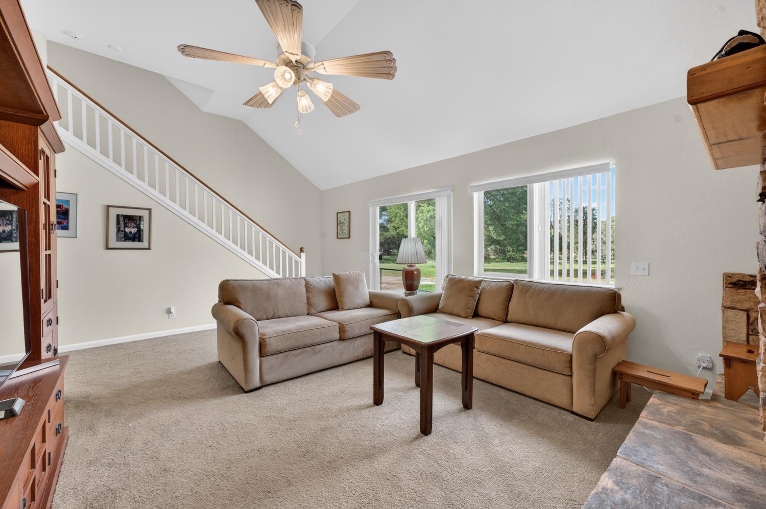 26583 Table Meadow Road Auburn, CA 95602 - Photo 29 of 77 a living room with furniture and a large window