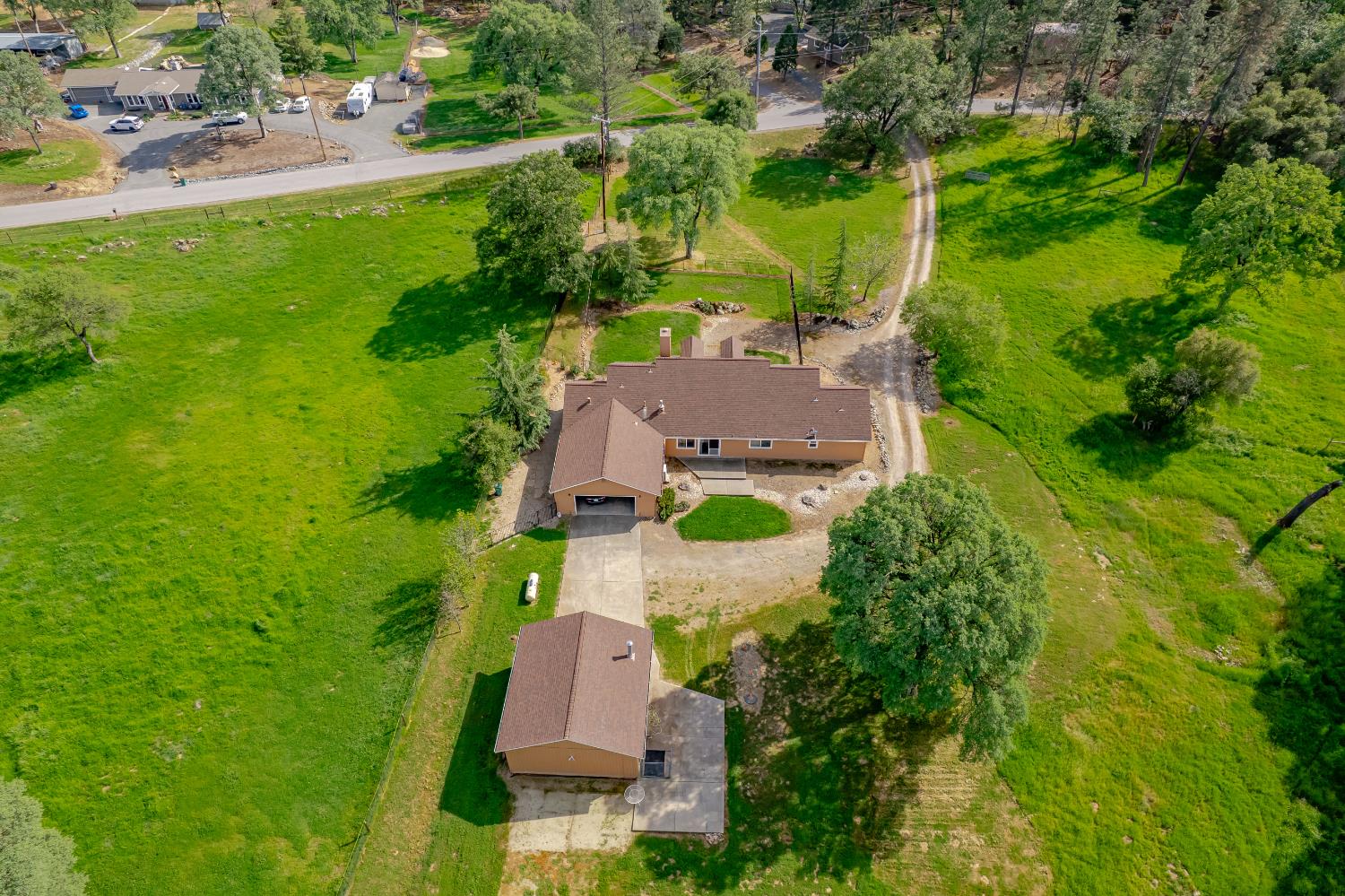 26583 Table Meadow Road Auburn, CA 95602 - Photo 8 of 77 an aerial view of a house with a yard