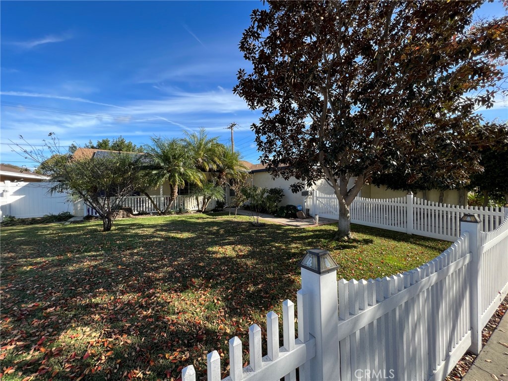 2256 Rutgers Drive Costa Mesa, CA 92626 - Photo 2 of 11 a view of a backyard with trees