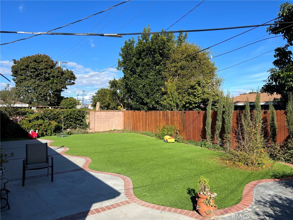 2256 Rutgers Drive Costa Mesa, CA 92626 - Photo 3 of 11 a backyard of a house with lots of green space