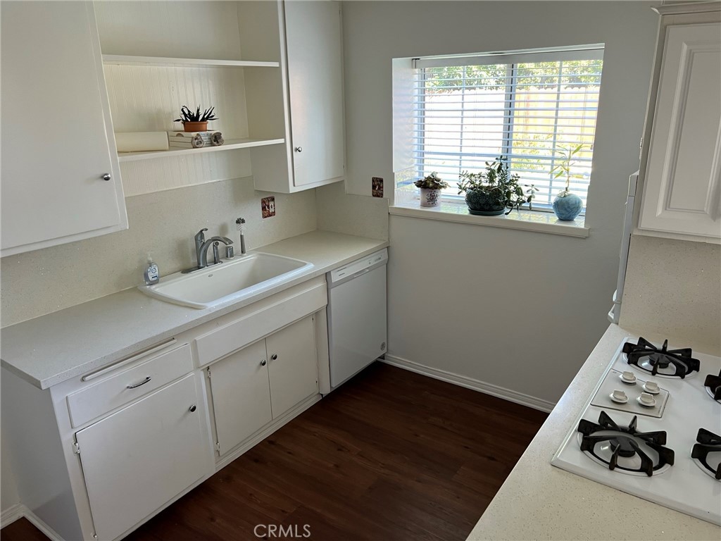 2256 Rutgers Drive Costa Mesa, CA 92626 - Photo 7 of 11 a utility room with sink dryer and washer