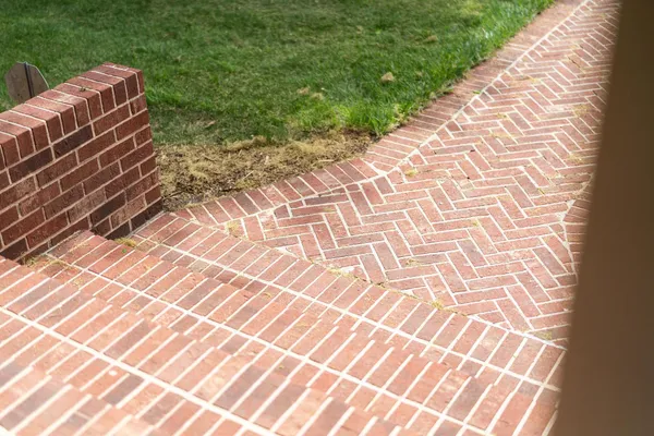 an aerial view of a house with a garden