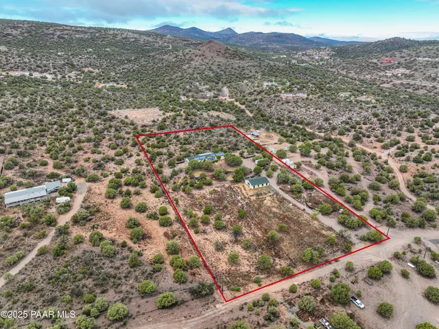 a view of a yard with an outdoor space