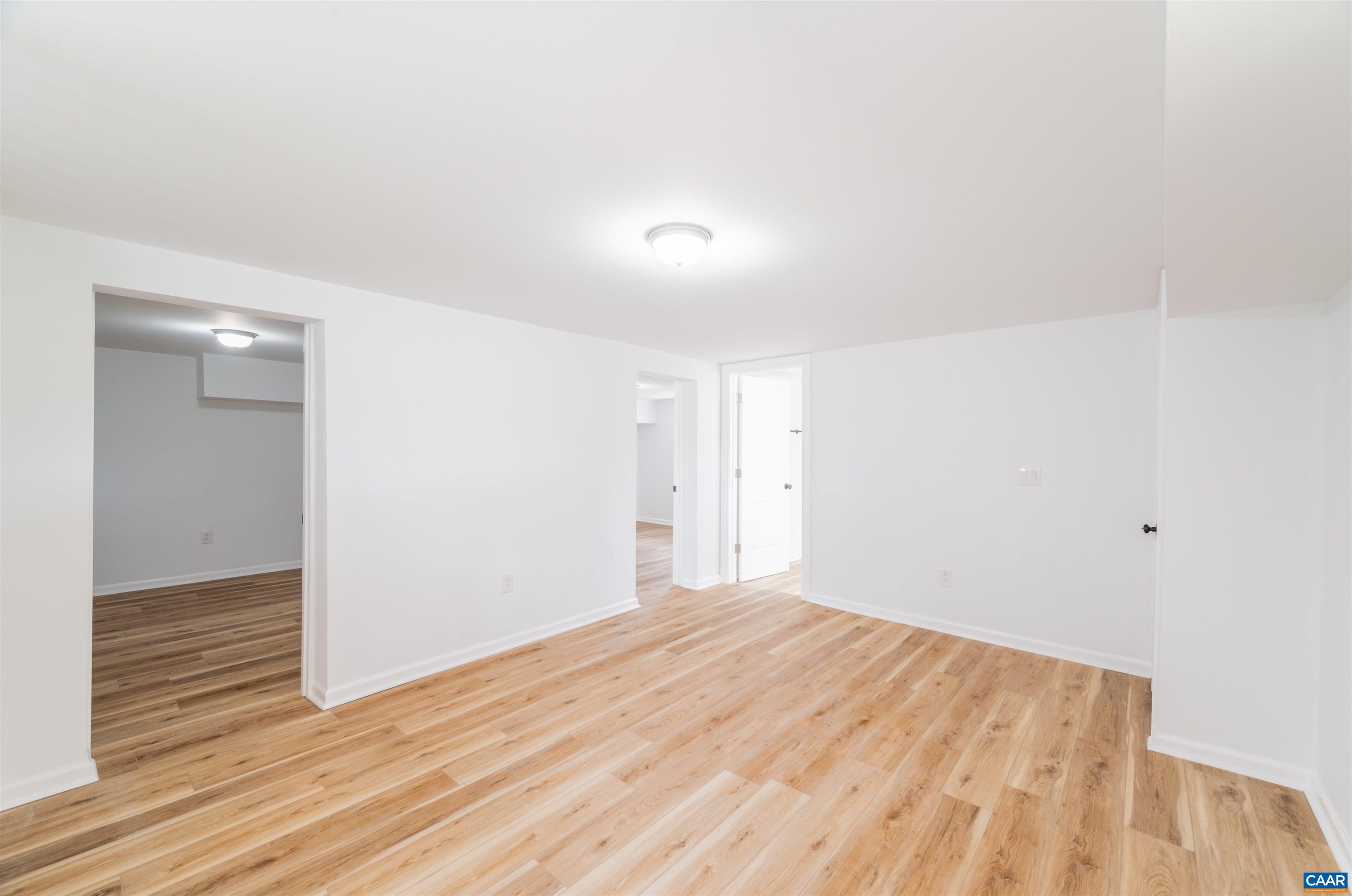 839 Ridge Street Charlottesville, VA 22902 - Photo 19 of 26 a view of empty room with wooden floor