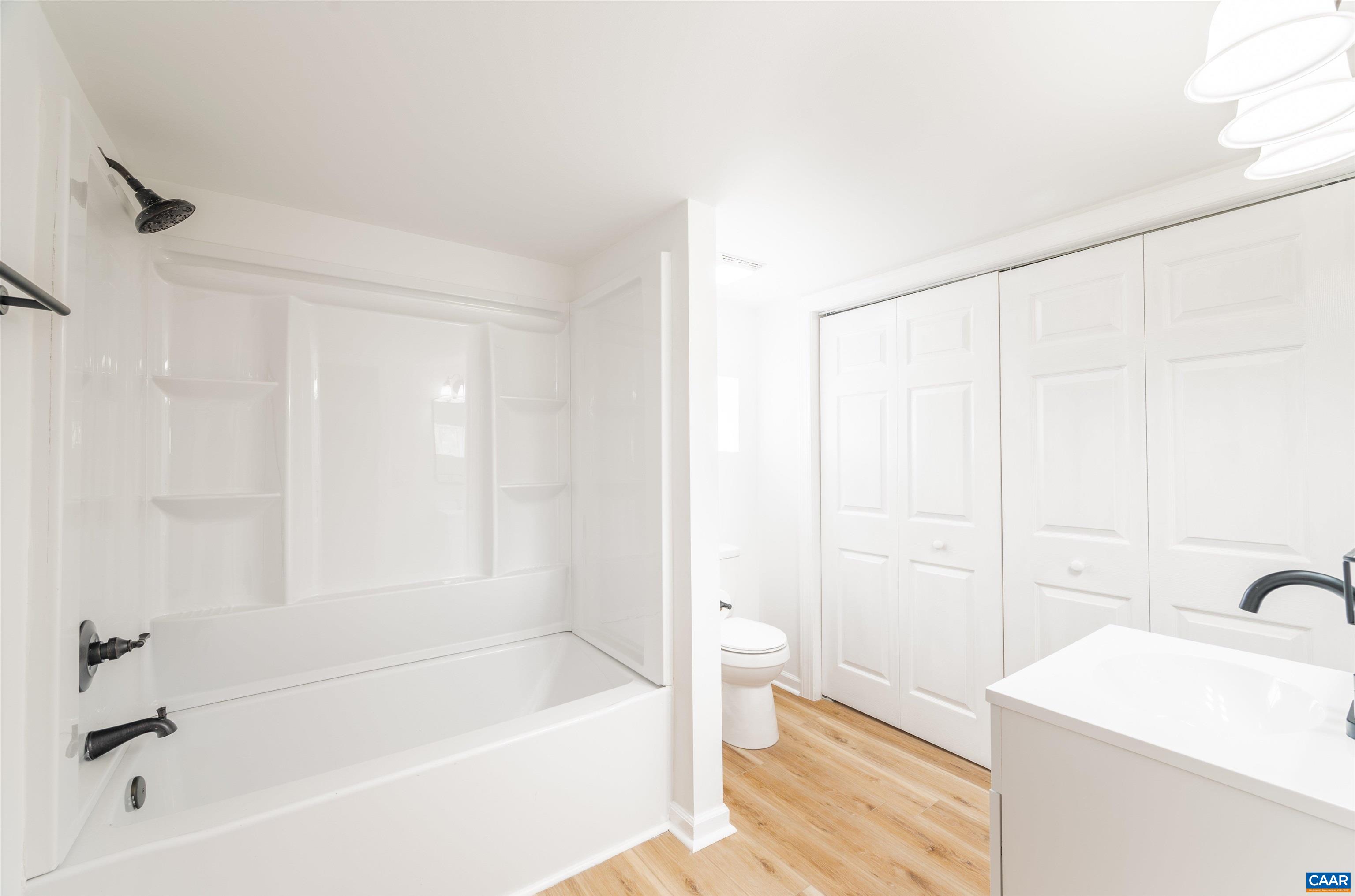 839 Ridge Street Charlottesville, VA 22902 - Photo 22 of 26 a bathroom with a sink a toilet and bathtub