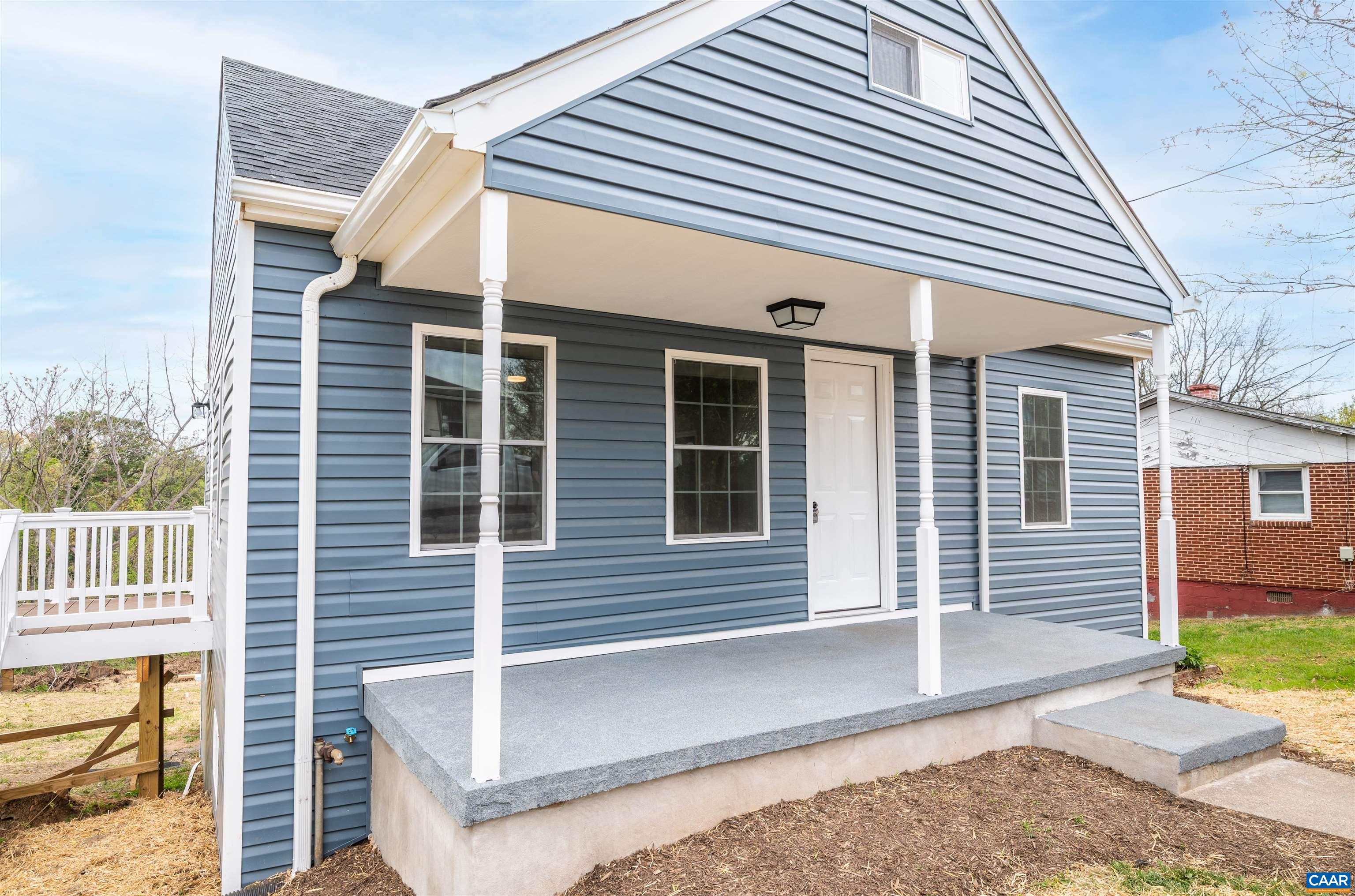 839 Ridge Street Charlottesville, VA 22902 - Photo 3 of 26 a front view of a house with a porch