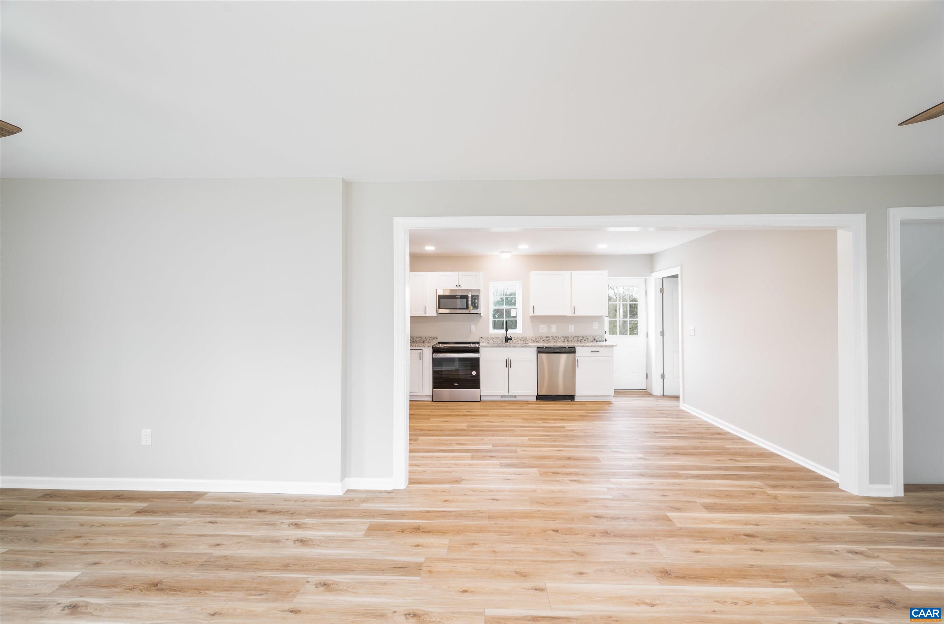 839 Ridge Street Charlottesville, VA 22902 - Photo 4 of 26 a view of a kitchen with wooden floor