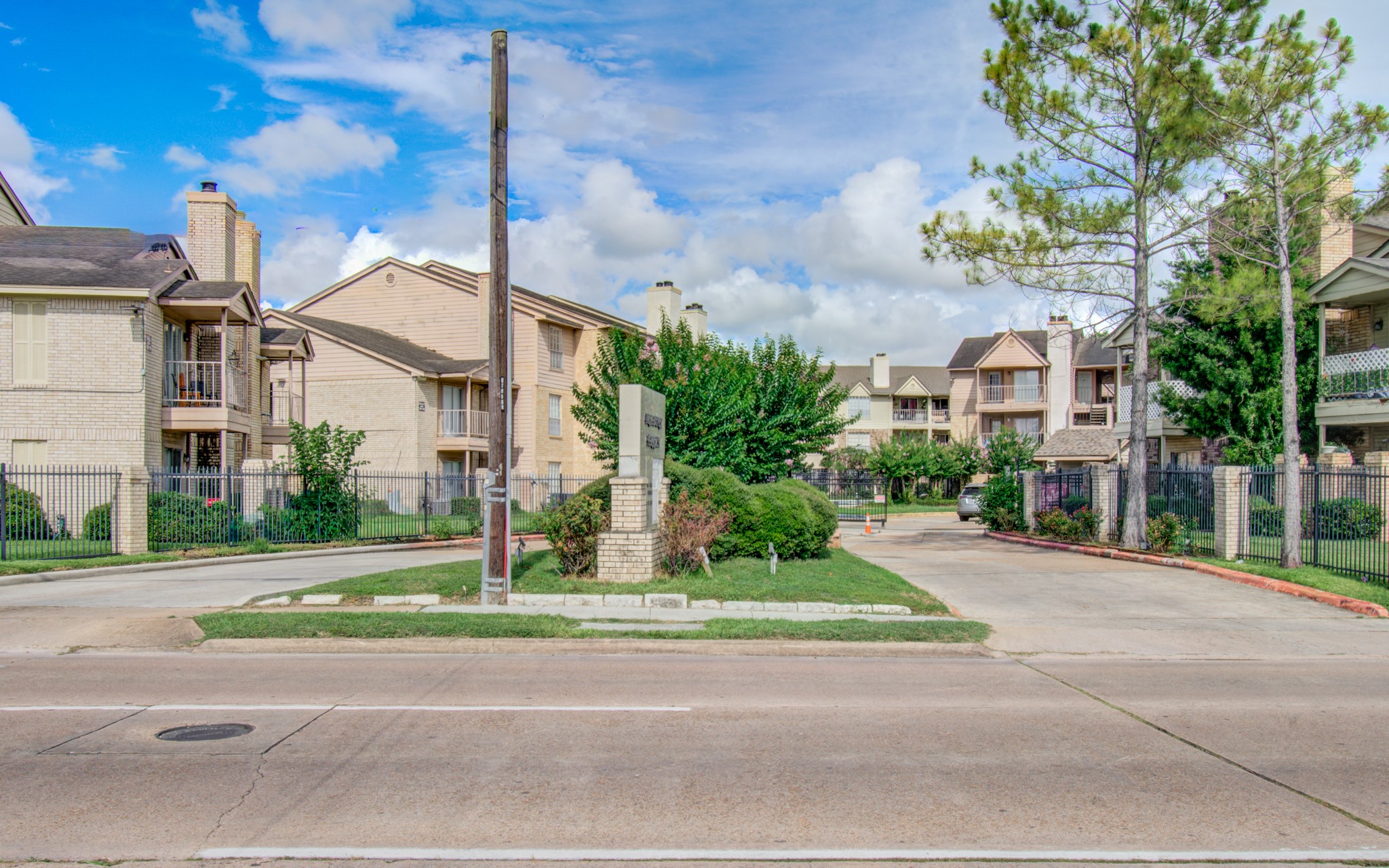 10101 South Gessner Road, Unit 405 Houston, TX 77071 - Photo 5 of 27 a view of a building with a yard
