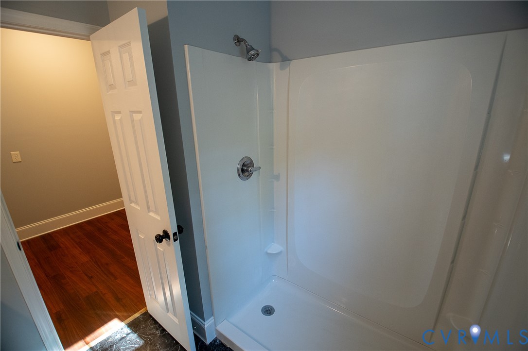 7491 Richmond Road Amelia Court House, VA 23002 - Photo 18 of 39 a bathroom with a shower