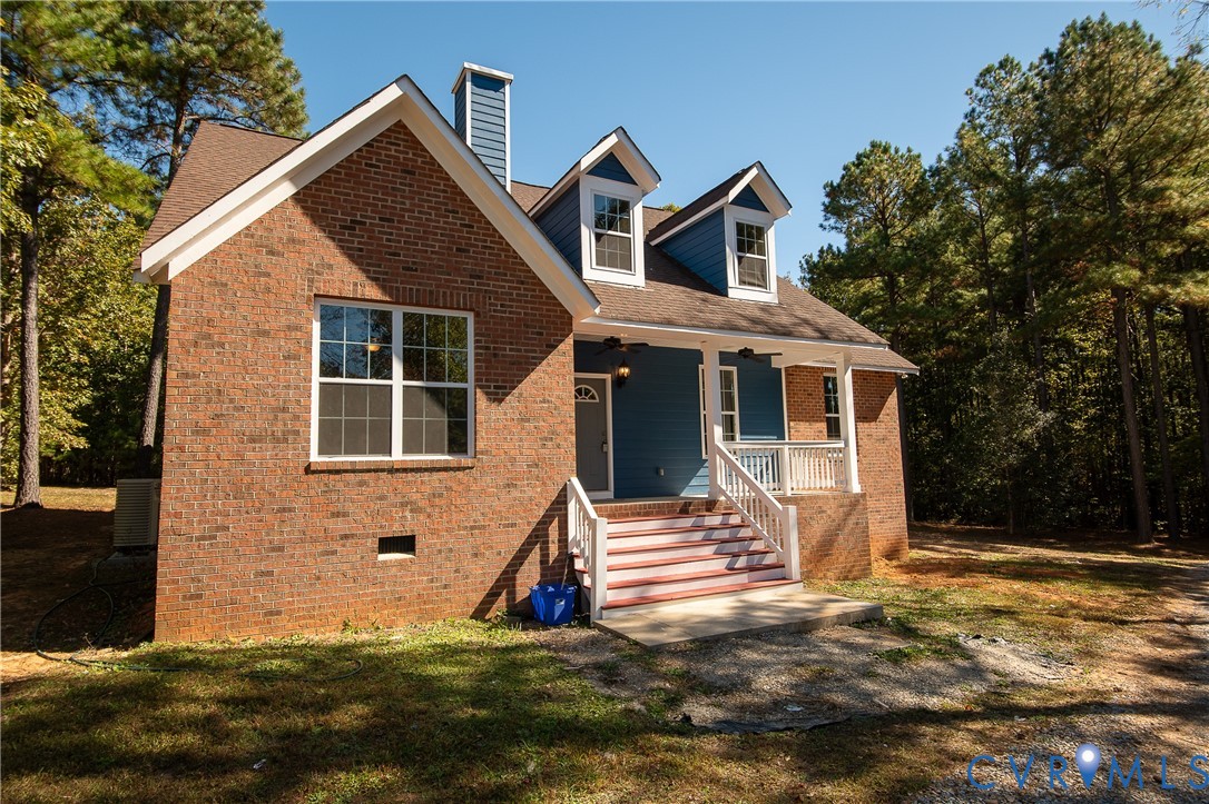 7491 Richmond Road Amelia Court House, VA 23002 - Photo 2 of 39 a front view of a house with a yard