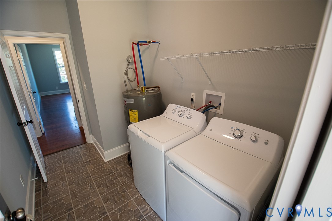 7491 Richmond Road Amelia Court House, VA 23002 - Photo 30 of 39 a utility room with dryer and washer