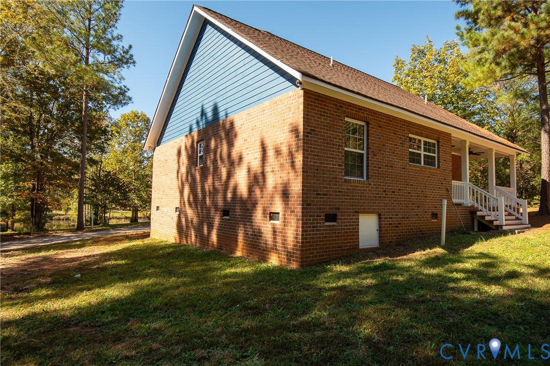 7491 Richmond Road Amelia Court House, VA 23002 - Photo 3 of 39 a view of a house with a yard