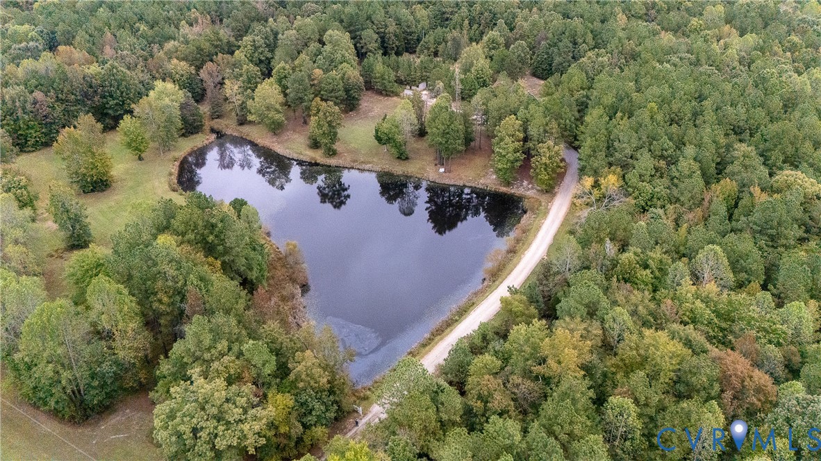 7491 Richmond Road Amelia Court House, VA 23002 - Photo 31 of 39 an aerial view of residential house with outdoor space and trees all around