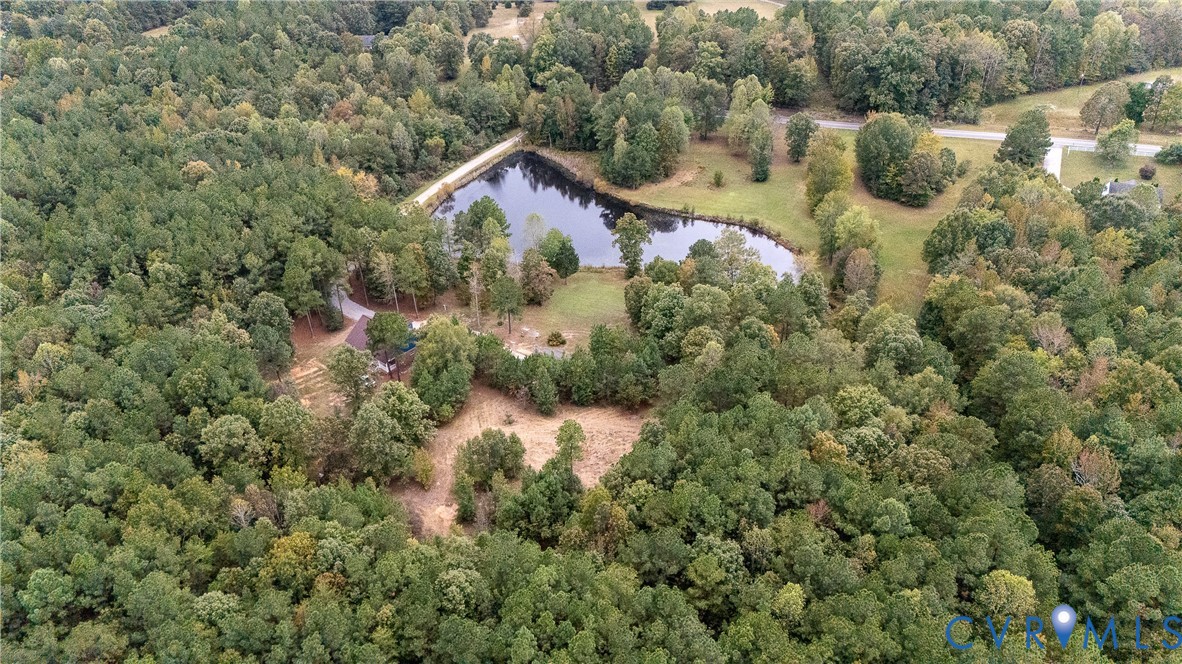 7491 Richmond Road Amelia Court House, VA 23002 - Photo 38 of 39 an aerial view of residential house with outdoor space and trees all around