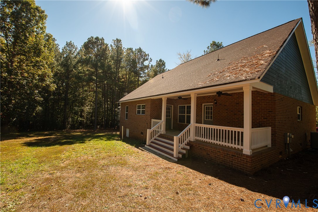 7491 Richmond Road Amelia Court House, VA 23002 - Photo 4 of 39 a view of a house with backyard and sitting area